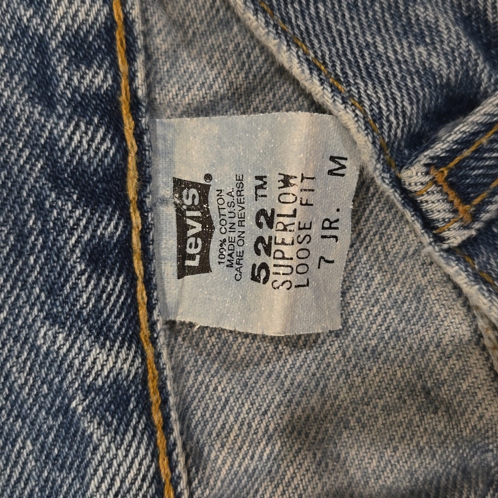 Levi's style 522 super low. Loose fit.